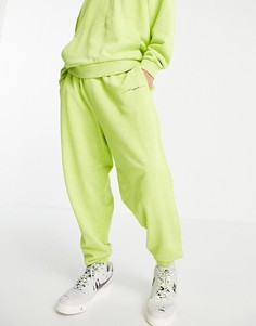 Зеленые oversized-джоггеры с эффектом кислотной стирки и текстовым принтом от комплекта ASOS DESIGN-Зеленый цвет