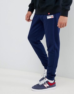 Темно-синие джоггеры с маленьким логотипом New Balance MP83515_PGM-Темно-синий
