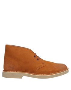 Полусапоги и высокие ботинки Clarks