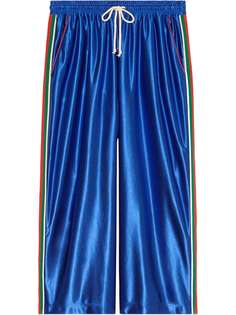 Gucci спортивные брюки широкого кроя с отделкой Web