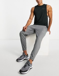Серые тканевые джоггеры Nike Running Challenger Dri-FIT-Серый
