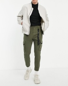 Брюки-карго в цвете хаки с отделкой черного цвета Bershka-Зеленый цвет