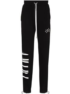 AMIRI logo-print track pants