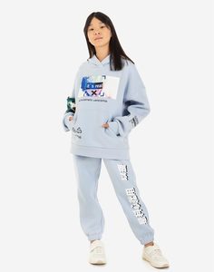 Голубые спортивные брюки Jogger с принтом для девочки Gloria Jeans