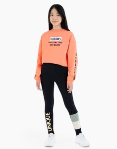 Чёрные леггинсы с принтом Unique и цветными вставками для девочки Gloria Jeans