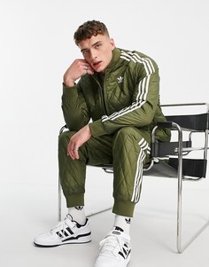 Стеганые спортивные брюки цвета хаки с тремя полосками adidas Originals Adicolor-Зеленый цвет