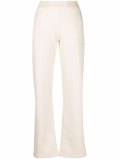 Off-White расклешенные спортивные брюки с полоской Diag