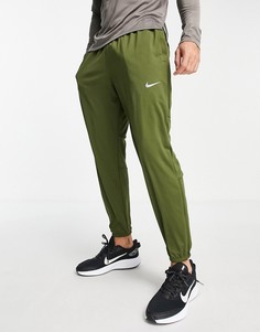 Трикотажные джоггеры цвета хаки Nike Running Challenger Dri-FIT-Зеленый цвет