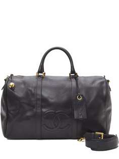 Chanel Pre-Owned дорожная сумка с тисненым логотипом CC