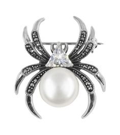 Серебряные броши Марказит