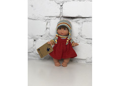 Куклы и одежда для кукол Lamagik S.L. Кукла Джестито Инфант в красном сарафане ухмыляется 18 см