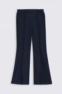 Трикотажные брюки Coccodrillo колокольчики темно-синего цвета с узором в горошек