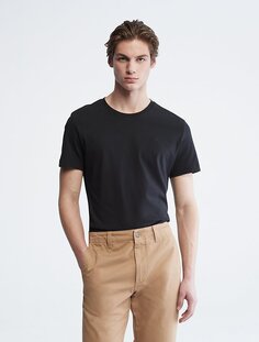 Гладкая хлопковая однотонная футболка с круглым вырезом Calvin Klein, черный