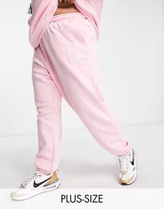 Нежно-розовые флисовые джоггеры Nike Plus Club