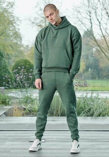 Спортивные брюки HERMAN&amp;CO, темно-зеленый Herman&Co