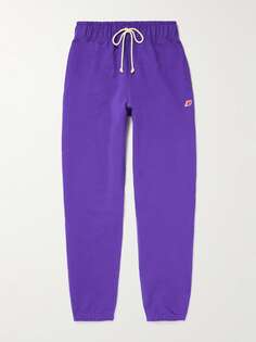 СДЕЛАНО в США Зауженные спортивные штаны из хлопкового джерси с аппликацией логотипа NEW BALANCE, фиолетовый