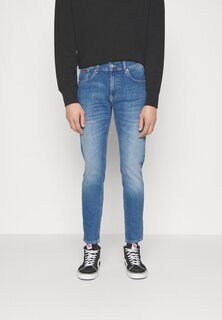 Зауженные джинсы Tommy Jeans