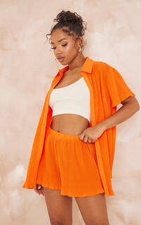 PrettyLittleThing Ярко-оранжевая свободная рубашка с короткими рукавами и пуговицами спереди со складками