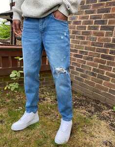 Классические синие жесткие джинсы средней степени стирки с рваными краями ASOS DESIGN