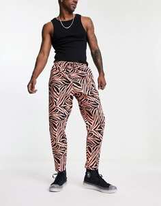 Зауженные брюки с тигровым принтом ASOS MADE IN KENYA