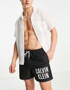 Черные плавки-шорты с логотипом на бедрах Calvin Klein