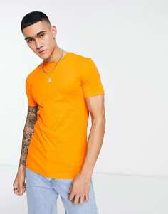 Оранжевая футболка с маленьким логотипом и монограммой на груди Calvin Klein Jeans