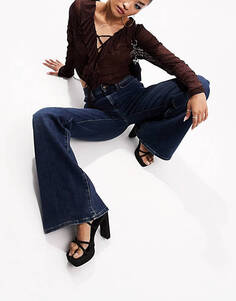 Расклешенные эластичные джинсы ASOS DESIGN &apos;70&apos;s