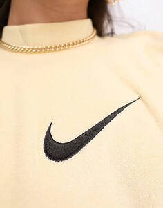 Укороченная махровая футболка миди с галочкой Nike бледно-ванильного цвета