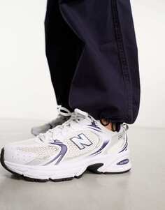 Белые и темно-синие кроссовки New Balance 530