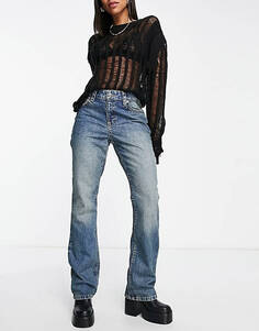 Синие расклешенные джинсы с низкой посадкой и карманами в стиле вестерн ASOS DESIGN