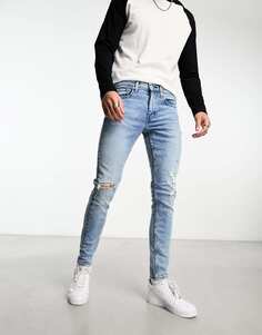 Голубые зауженные джинсы Levi&apos;s Skinny с потертостями Levis