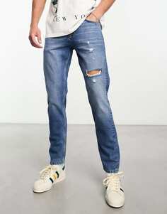 Голубые узкие джинсы с рваными краями ASOS DESIGN
