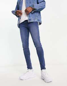 Спрей ADPT на джинсах-скинни средне-синего оттенка
