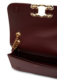 Средняя сумка Triomphe в каркасе из блестящей телячьей кожи. Celine