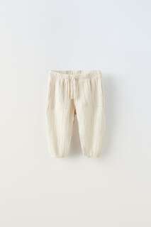 Текстурные брюки Zara, камень