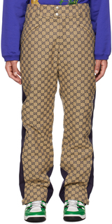 Бежевые и темно-синие брюки с узором GG Gucci