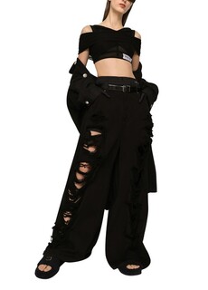 Расклешенные джинсы с рваными деталями Dolce &amp; Gabbana