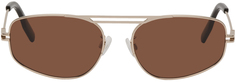 Золотые овальные солнцезащитные очки MCQ