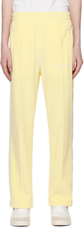 Желтые спортивные брюки с защипами Palm Angels