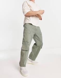 Зеленые зауженные брюки свободного кроя ASOS DESIGN