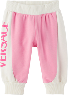 Детские розово-белые спортивные штаны с принтом Ярко-розовый Versace
