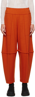 Оранжевые заправленные брюки ISSEY MIYAKE
