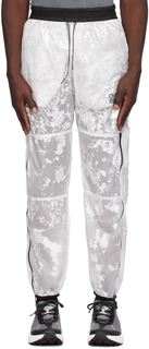Белые спортивные брюки со вставками OVER OVER