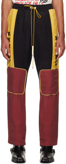 Желтые и бордовые брюки Rhude со вставками