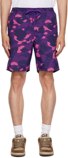 BAPE Двусторонние шорты фиолетового цвета с камуфляжным принтом и изображением акулы