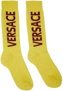Желтые носки с логотипом Versace