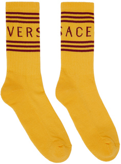 Желтые носки с логотипом Versace