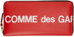 Красный кошелек с огромным логотипом Comme des Garçons