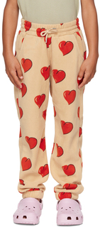 Детские бежевые флисовые брюки с сердечками Бежевые Mini Rodini