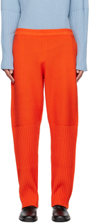 Оранжевые спортивные штаны в деревенском стиле Powerful HOMME PLISSe ISSEY MIYAKE